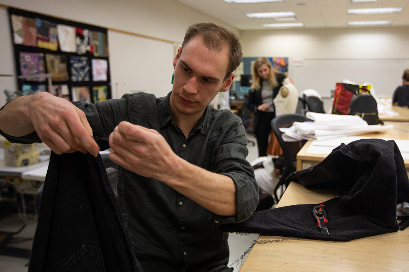 Student sewing clothing Student sewing clothing